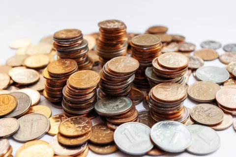 Big heap of columns of different Russian coins on white background. Stock Photos