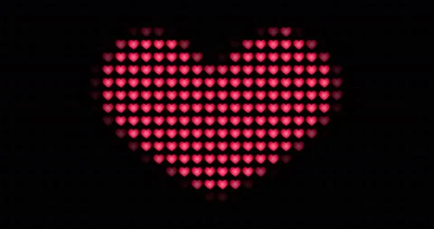 A big heart of red hearts increases and decreases on a black background, looped Stock Footage 101882654