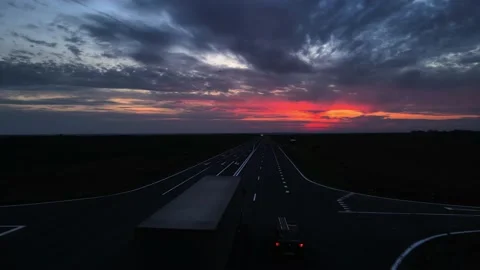 A big highway on the background of a scarlet sunset Stock Footage 211810889