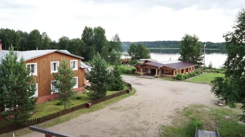 A big house and an empty place next to it Stock Footage 163567797