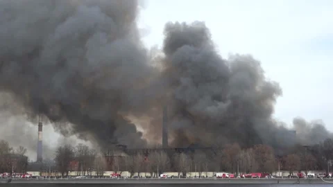 Big house is on fire. Lots of fire trucks. River embankment near. Brick house Stock Footage 165165870