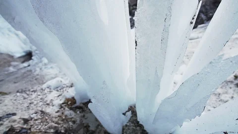 A big ice structure under a waterfall Stock Footage 103216570