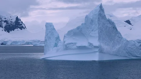 Big iceberg floating in Antarctica Stock Footage 303566503
