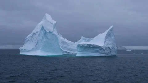 Big iceberg floating in Antarctica Stock Footage 303567345