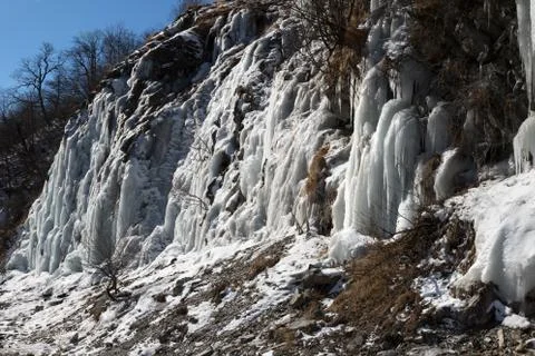 Big icefall in mountain at nice sun day Stock Photos
