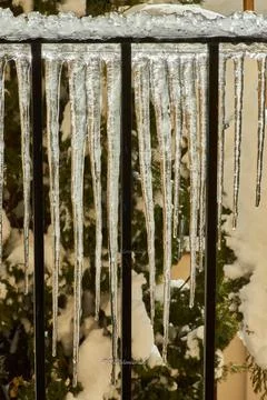 Big icicles on balcony. Stock Photos