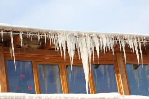 Big icicles in a cold day Stock Photos