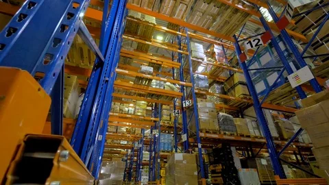 Big indutrial warehouse interior. Storage facility with no people. 4K. Stock Footage 79787951
