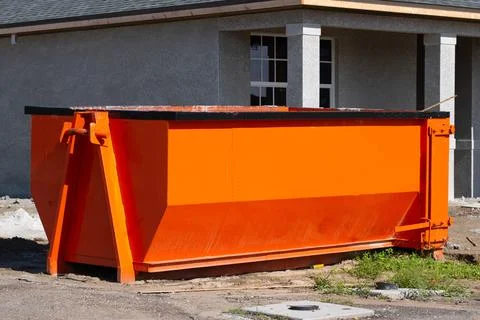 Big iron dumpster the construction site Stock Photos