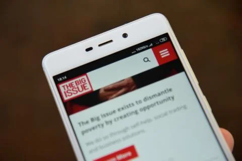 The Big Issue seen on the smartphone screen Stock Photos
