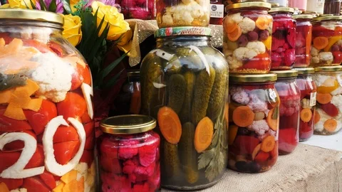 Big jars with pickles Stockbeeldmateriaal 125054488