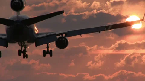 Big jet crossing the sun Stock Footage 24692200