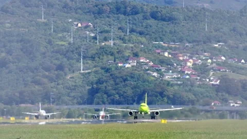 Big jet plane on blue cloudy sky background. Sochi International Airport in the Vidéo 146597786