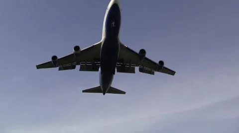 Big jet plane passes low Stock Footage