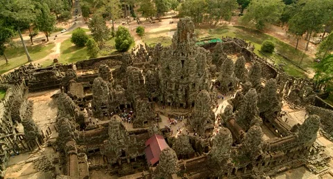 Big Jib down over Angkor Temple Ruins in Cambodia Video stock 125152637