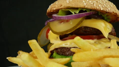 Big juicy double cheeseburger Stock Footage 241803682
