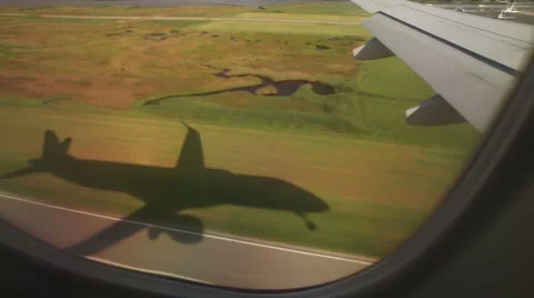 Big Jumbo jet airplane landing - shadow of the plane Stock Footage 68382469