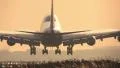 Big Jumbojet landing at sunrise HD Footage