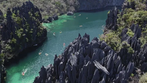 A big lagoon in El Nido Drone flies around cliffs Stock Footage 273175392