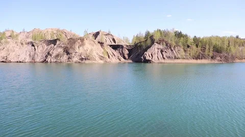 Big lake with trees and sand hills Stock Footage 117431013