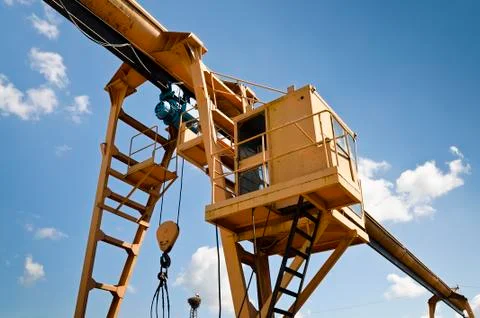 Big lifting crane in the factory Stock Photos