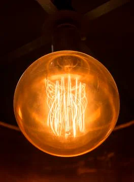 Big lightbulb turned on Stock Photos