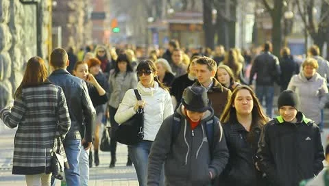The big lighted by sun people crowd in the city Stock Footage 10846430