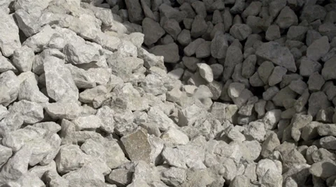 Big limestones ready for grinding Stock Footage 38586900