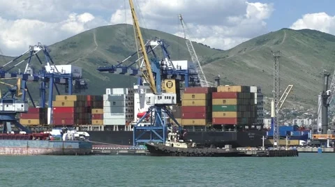 Big Loaded Cargo Ship is Waiting For Unloading in Big Southern Seaport Stock Footage 64818232