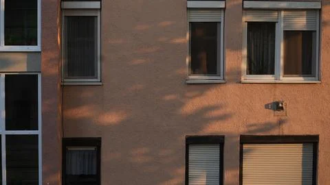 Big long window of a huge common house with a lot of flats Stock Photos