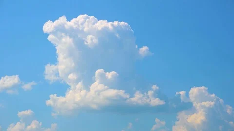 Big lush clouds in the blue sky. Beautiful white cloud Video stock 111449559