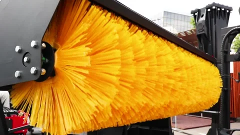 Big massive rotating brush , special machinery for roads cleaning, snow Stock Footage 149805988