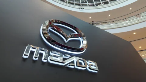 Big MAZDA sign was presented at the Motor Show Stock Footage 289108822