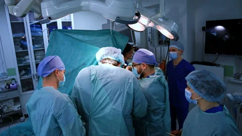 Big medical team of doctors working in t... | Stock Video | Pond5