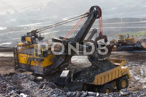 Big mining truck working Stock Photos