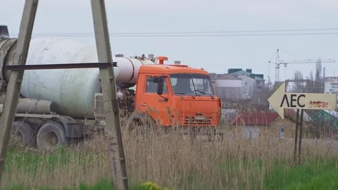 Big mixer on the road Stock Footage 107346801