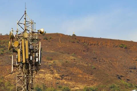 Big mobile tower on the mountain side Stock Photos