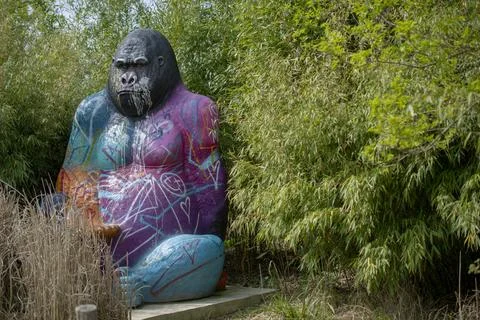 Big Monkey Statue. The statue is covered in graffiti. Stock Photos