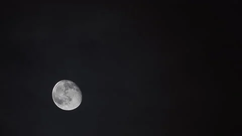 Big Moon with Cloud Movement at hot summer night when overheated air causes v Stock Footage 146466288