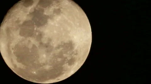 Big moon in the sky. The view through the clouds Stock Footage 46911760