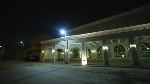 Big mosque in Riyadh Saudi Arabia outdoor at night movement shot, lift to Stock Footage 149451223
