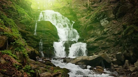 Big mountain waterfall with light effect Stock Footage 69793110