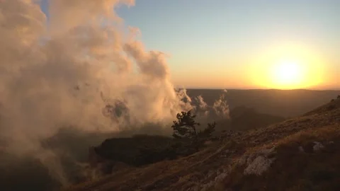 The big mystic cloud in the mountains with soft sunset Stock Footage 185003812