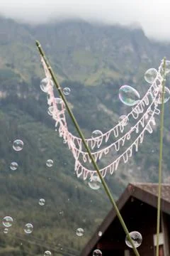 Big net creating soap bubbles Stock Photos