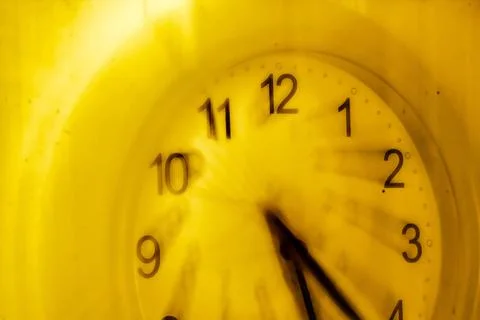 Big numbers on the wall clock Stock Photos
