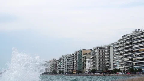 Big ocean wave splashing in panoramic view on Thessaloniki sea front modern Stock-Footage 94938306