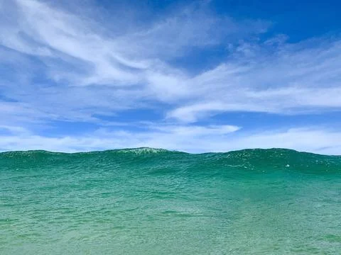 Big Ocean Wave Under Blue Sky Stock Photos