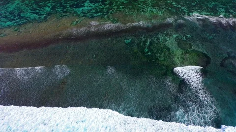 Big ocean waves hitting a coral rif. Aerial 4k footage. Stock Footage 129502745