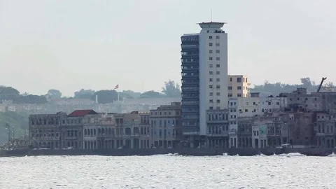 Big oceanic waves crash on Malecon enbankment, Havana, Cuba Stock Footage 76888961