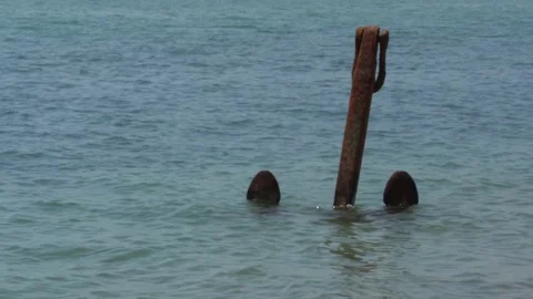 Big old Anchor in blue water near coast in Arkhipo-Osipovka. Stock Footage 155116061